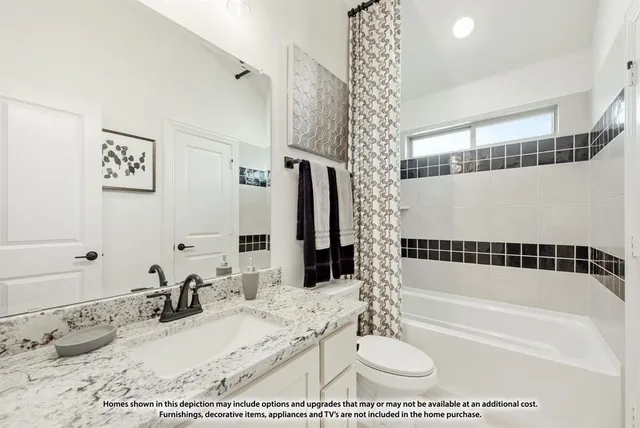 a bathroom with a tub sink and a mirror