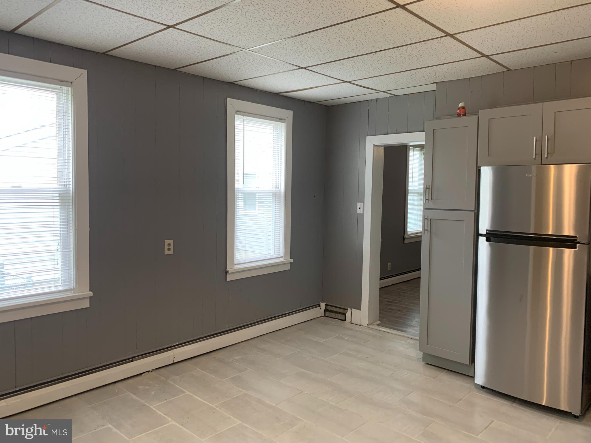 822 Columbus Road Burlington, NJ 08016 - Photo 18 of 32 a view of an empty room with a window