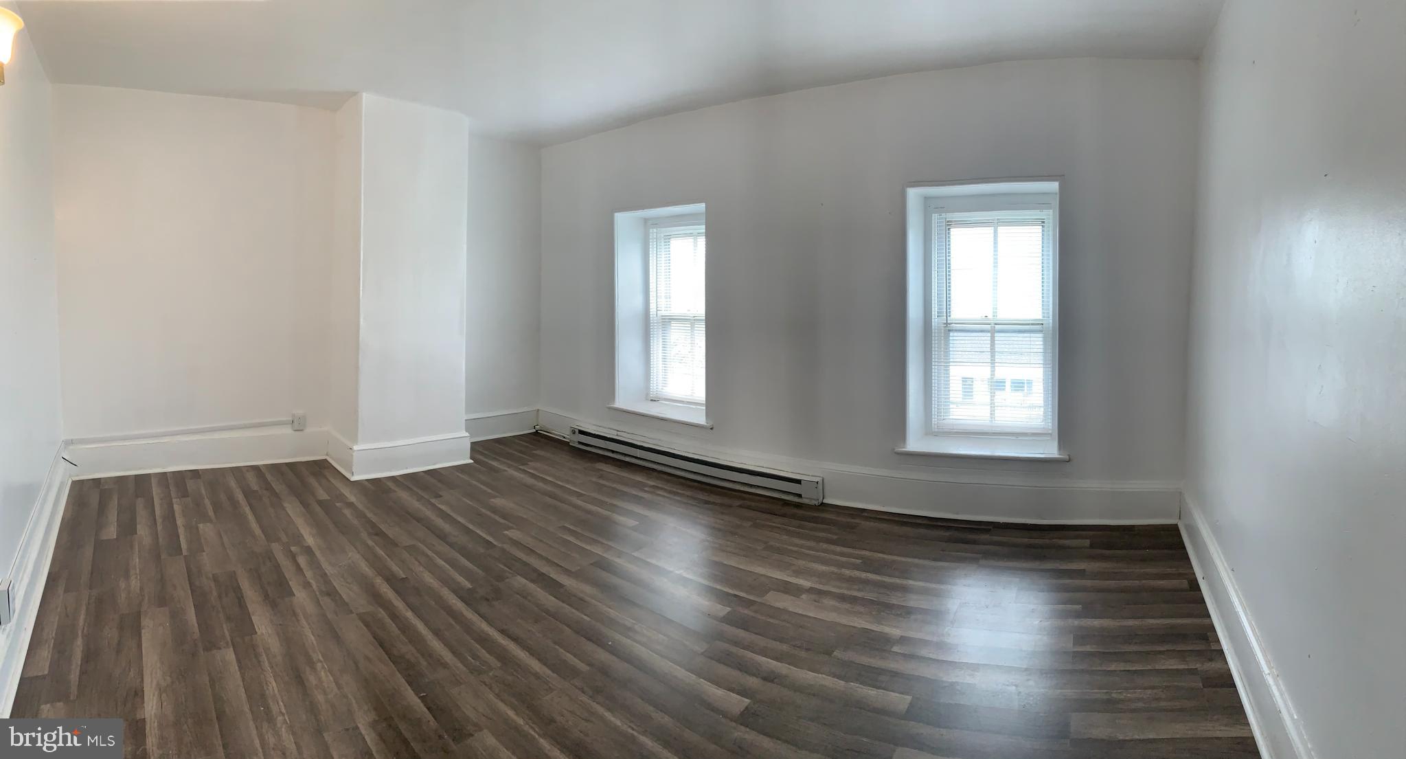 822 Columbus Road Burlington, NJ 08016 - Photo 29 of 32 an empty room with wooden floor and windows