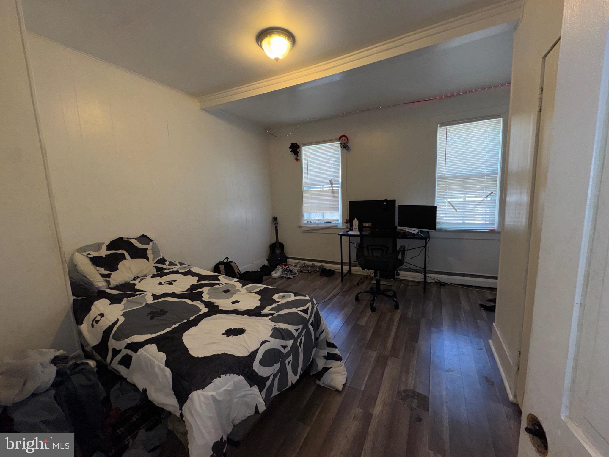 822 Columbus Road Burlington, NJ 08016 - Photo 32 of 32 a bedroom with a bed and wooden floor