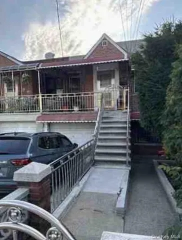 a front view of house with yard and seating area