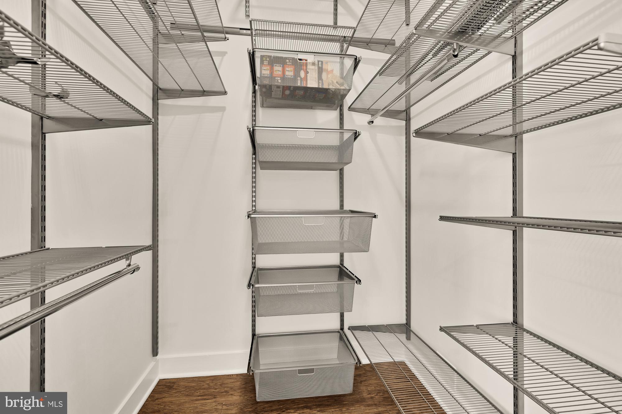 2000 D Street Northeast, Unit 6 Washington, DC 20002 - Photo 15 of 30 a view of walk in closet with empty racks