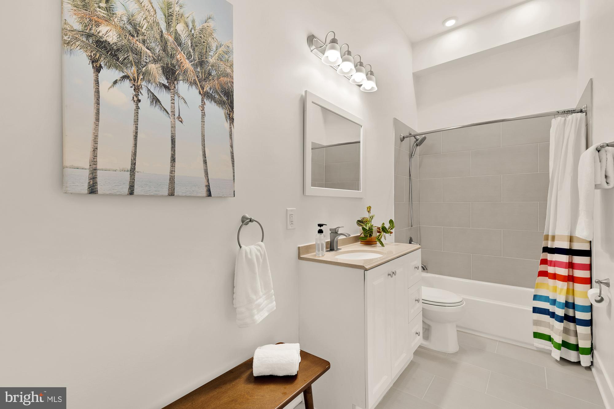 2000 D Street Northeast, Unit 6 Washington, DC 20002 - Photo 18 of 30 a bathroom with a sink toilet and shower