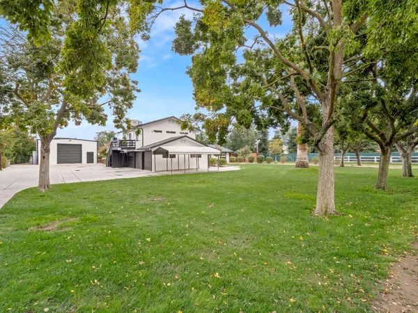 a view of kitchen and kitchen with a sink