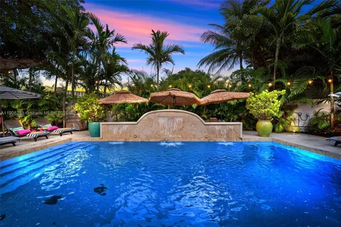 a view of a dining tables and chairs in a patio