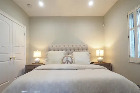 a bathroom with a shower and a sink