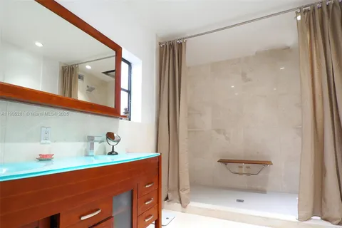 a view of swimming pool with outdoor seating