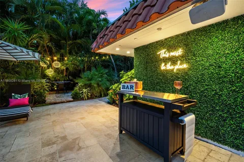 a view of a golf course with chairs