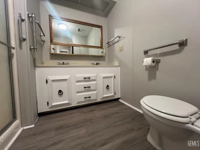 a view of an empty room with windows