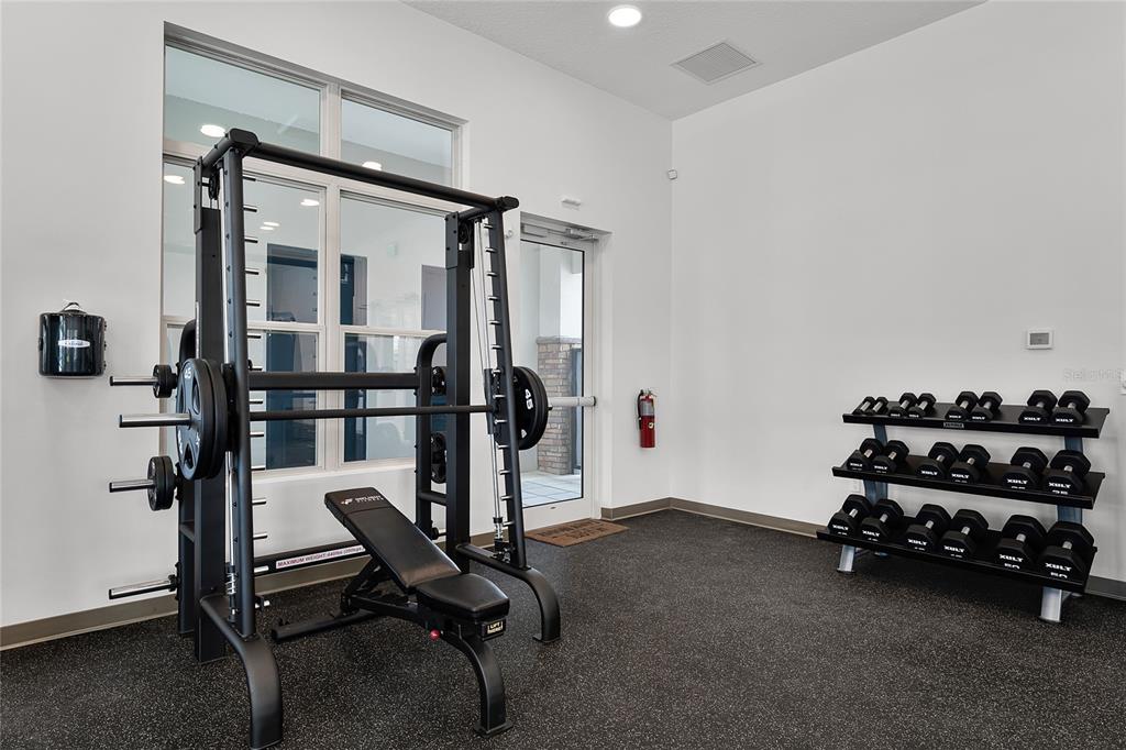 1812 Three Bars Road Kissimmee, FL 34744 - Photo 39 of 64 a view of a room with gym equipment