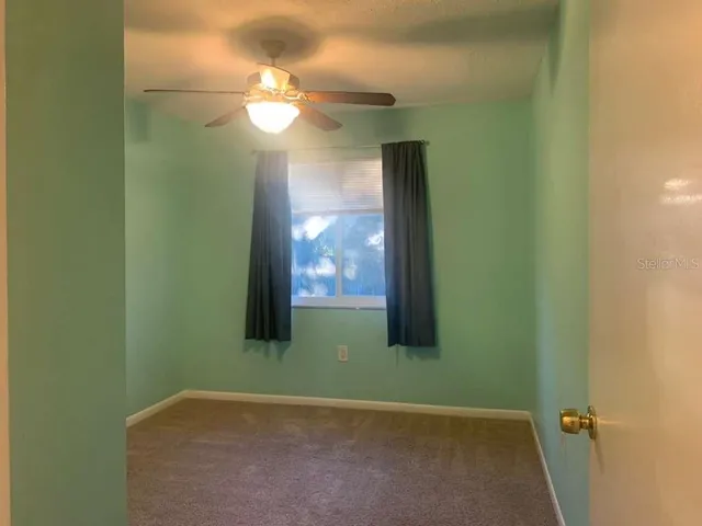 a view of a room with a door