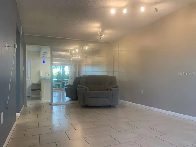 a lobby with furniture and a shower
