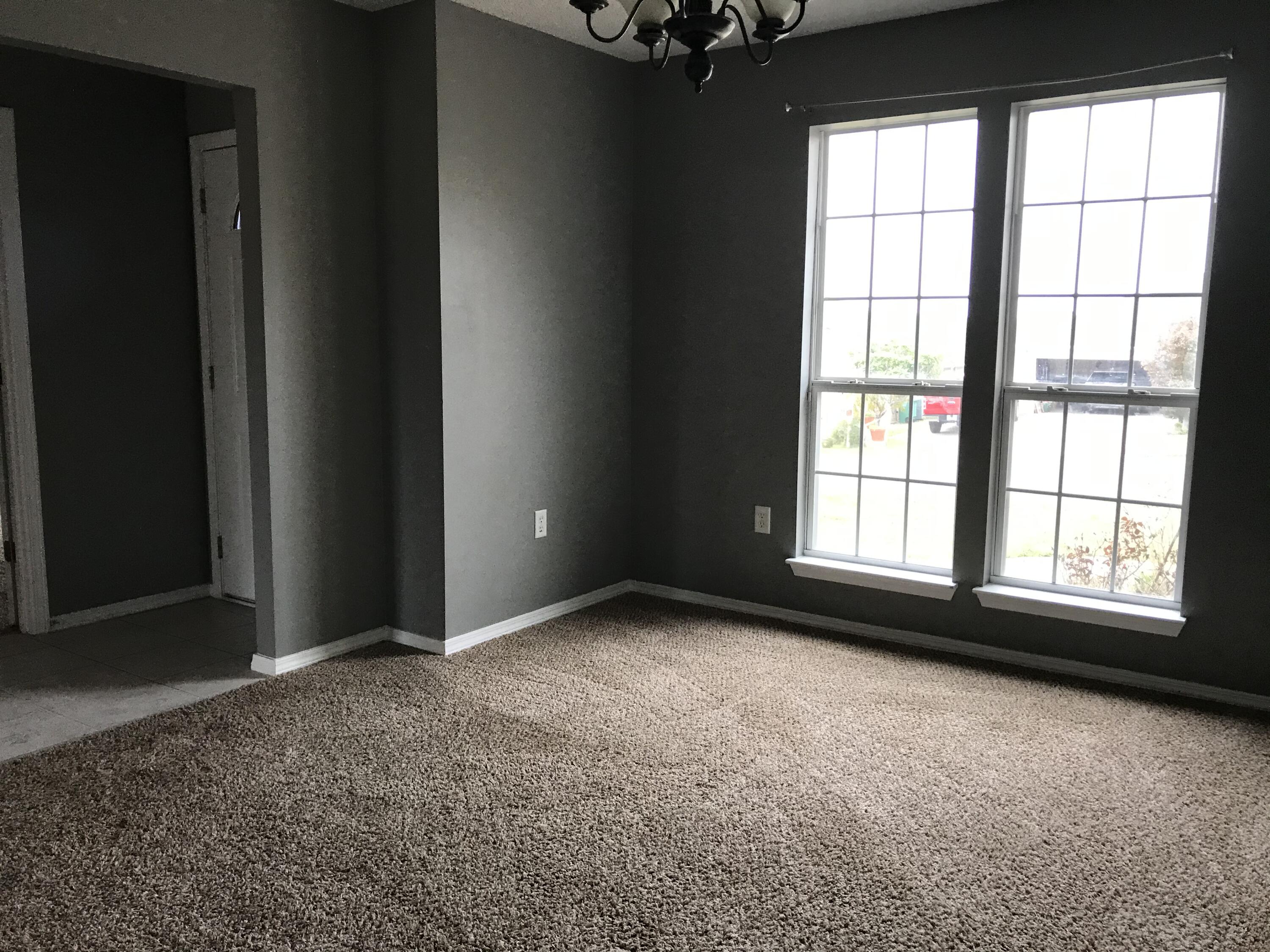 804 Travis Court Crestview, FL 32536 - Photo 15 of 33 an empty room with windows