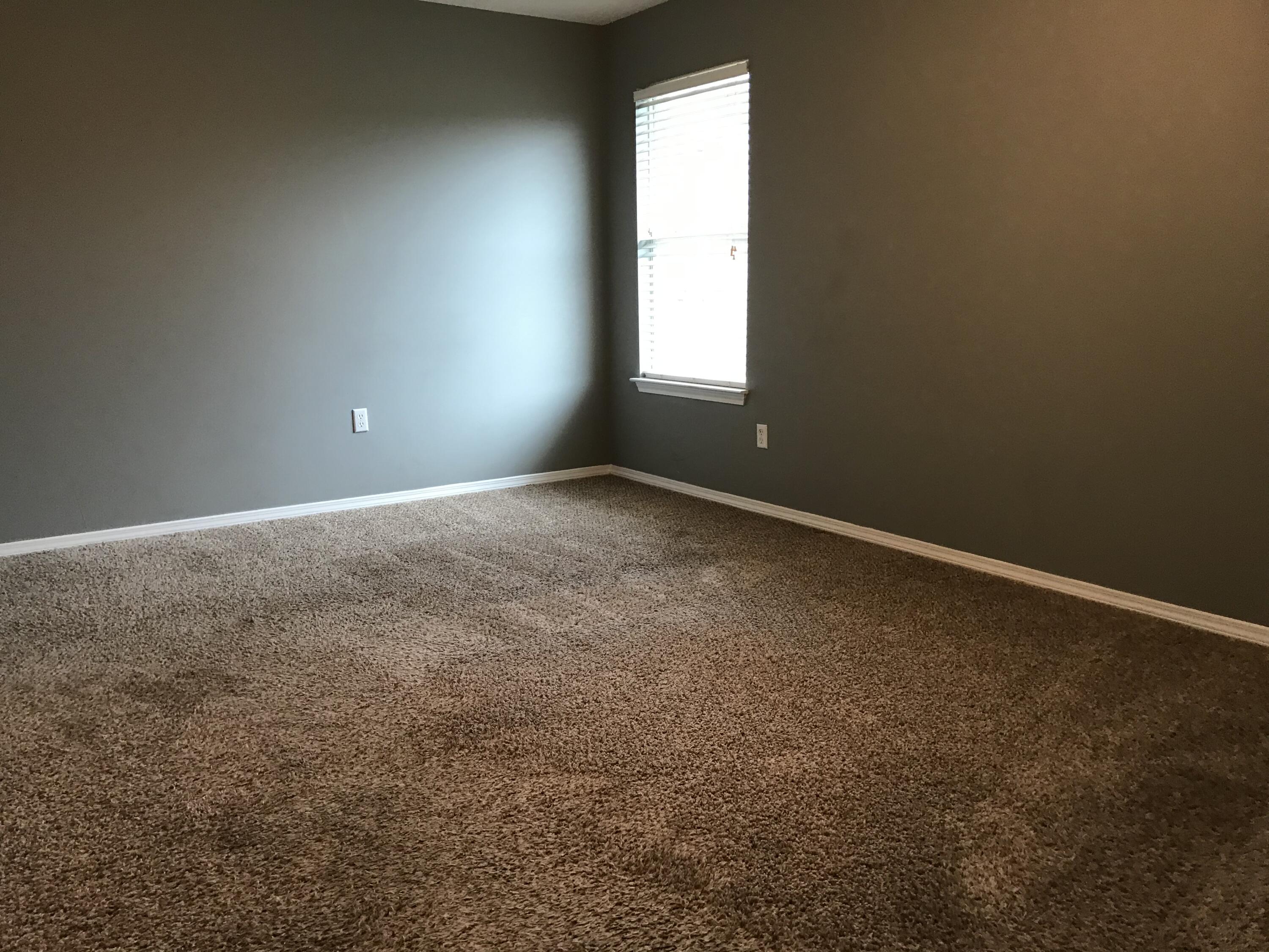 804 Travis Court Crestview, FL 32536 - Photo 23 of 33 an empty room with windows