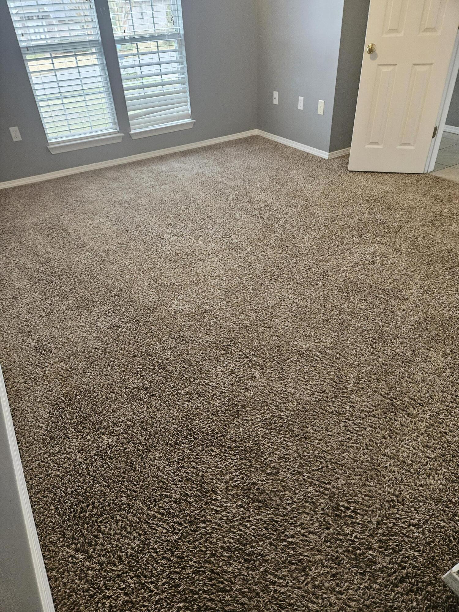 804 Travis Court Crestview, FL 32536 - Photo 9 of 33 an empty room with windows