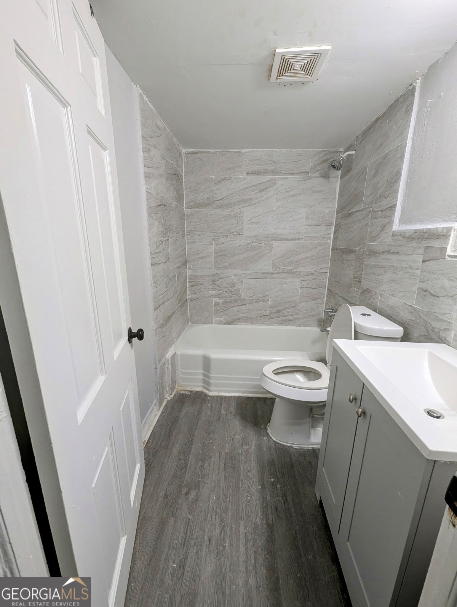 260 Patterson Avenue Southeast, Unit A Atlanta, GA 30316 - Photo 9 of 16 a bathroom with a sink a toilet and shower