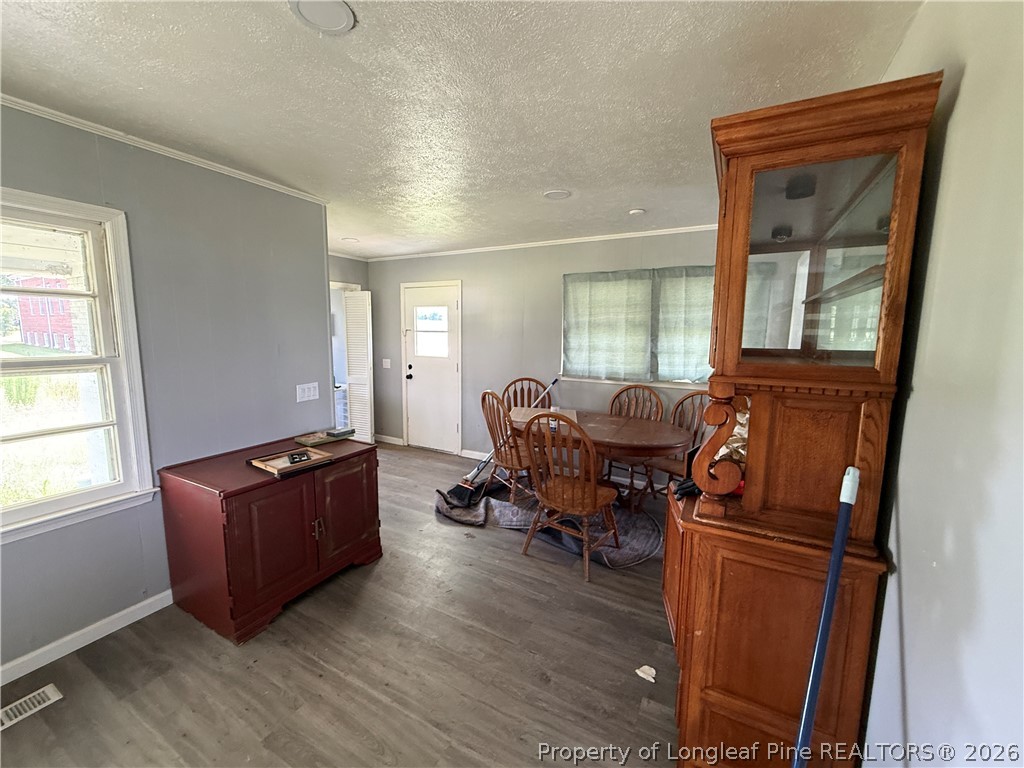 736 Tobermory Road Fayetteville, NC 28306 - Photo 11 of 17 a living room with furniture and a window