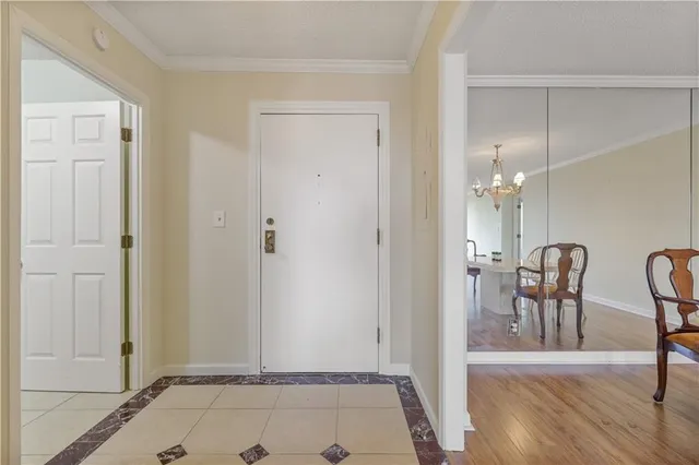 a view of a livingroom with furniture and wooden floor