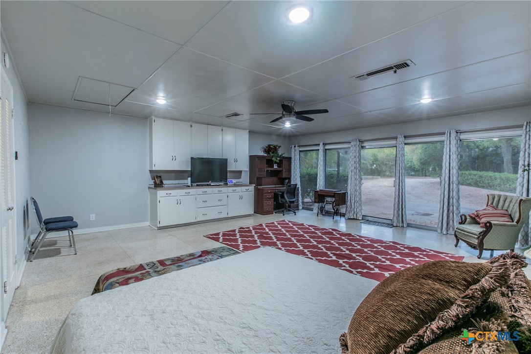 2518 Marlandwood Road Temple, TX 76502 - Photo 25 of 48 a bedroom with a large bed and a large window
