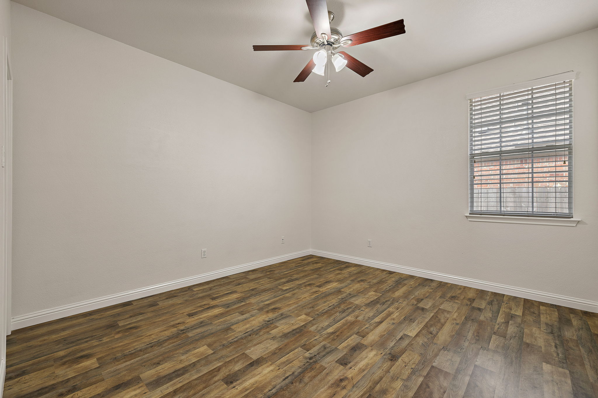 1115 Canyon Maple Road Pflugerville, TX 78660 - Photo 24 of 34 Secondary bedroom with LVP flooring