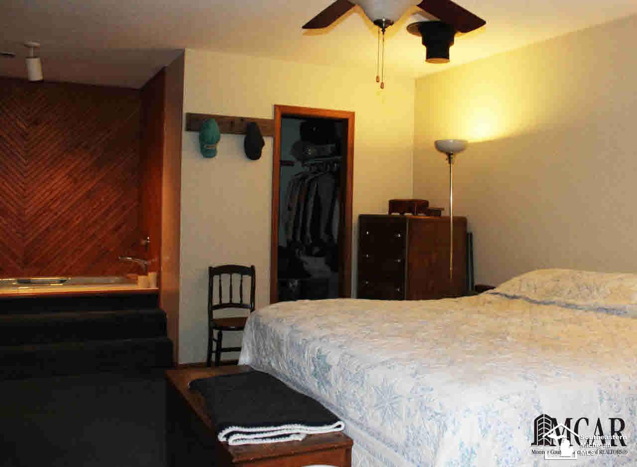 12165 West Albain Road Ida, MI 48140 - Photo 9 of 25 Master Bed W/Walk-inCloset