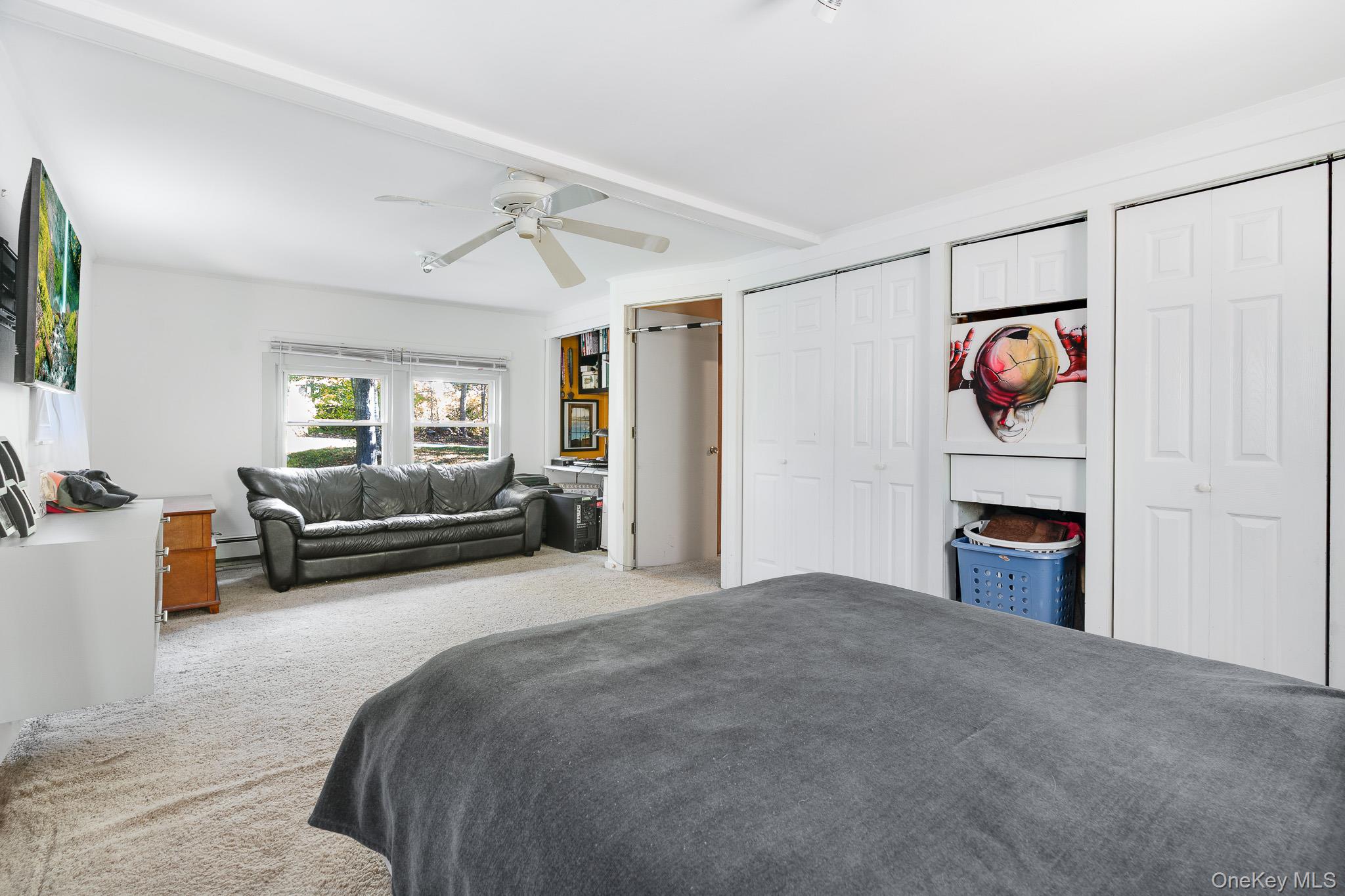 553 Hosner Mountain Road Stormville, NY 12582 - Photo 13 of 36 a bedroom with furniture and white walls