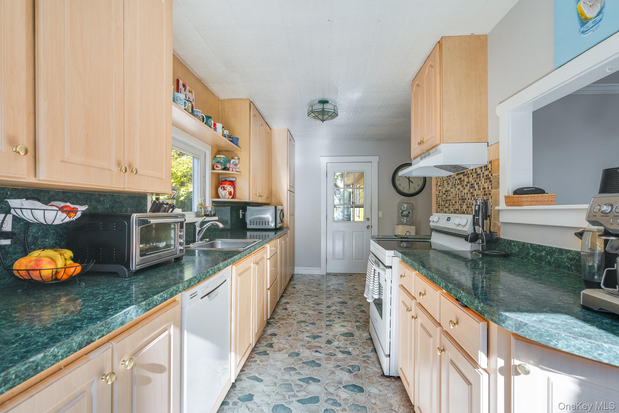 553 Hosner Mountain Road Stormville, NY 12582 - Photo 15 of 36 a kitchen with stainless steel appliances granite countertop a sink and stove