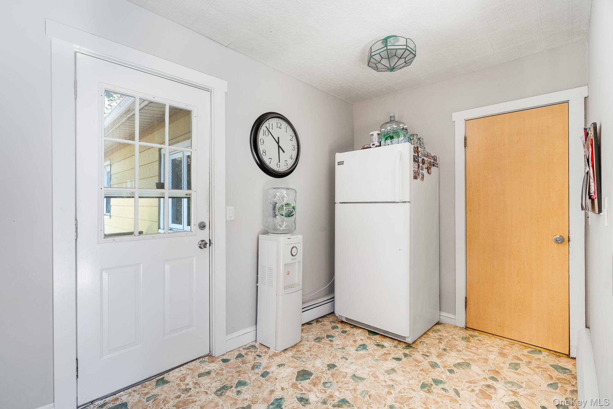 553 Hosner Mountain Road Stormville, NY 12582 - Photo 18 of 36 a view of kitchen with washer and dryer