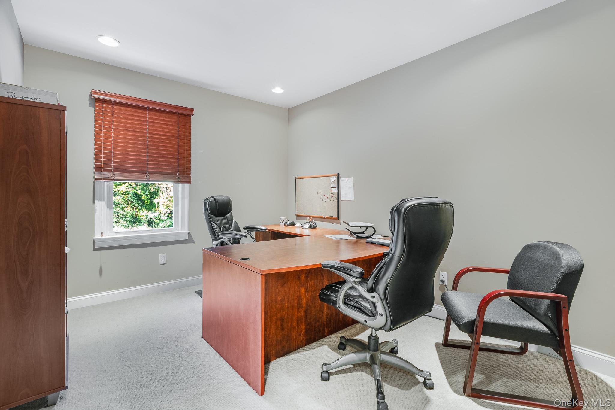 553 Hosner Mountain Road Stormville, NY 12582 - Photo 25 of 36 a view of a workspace with furniture and a window