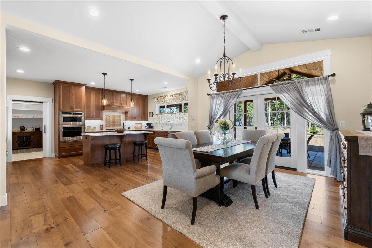 French doors lead to huge covered patio.