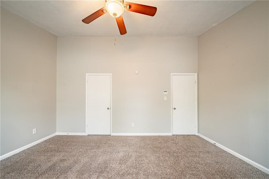 5175 Walker Road Stone Mountain, GA 30088 - Photo 15 of 37 an empty room with a window