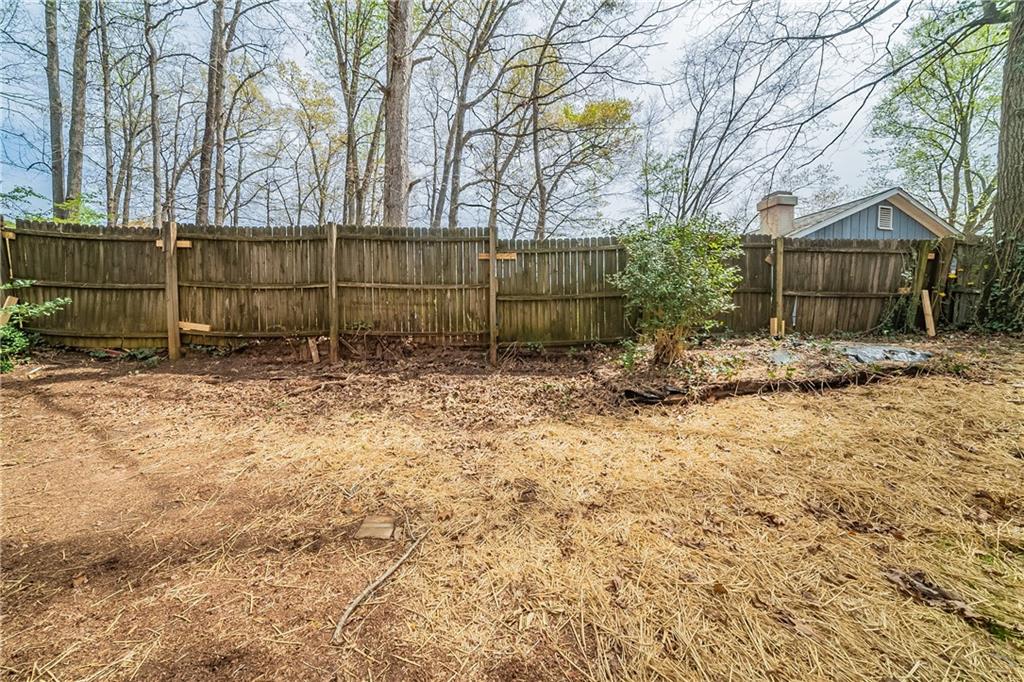 5175 Walker Road Stone Mountain, GA 30088 - Photo 30 of 37 a view of a backyard