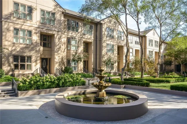 a view of fountain in front of building