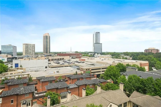 a view of a city with tall buildings