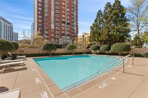 a view of a chairs and tables in the patio