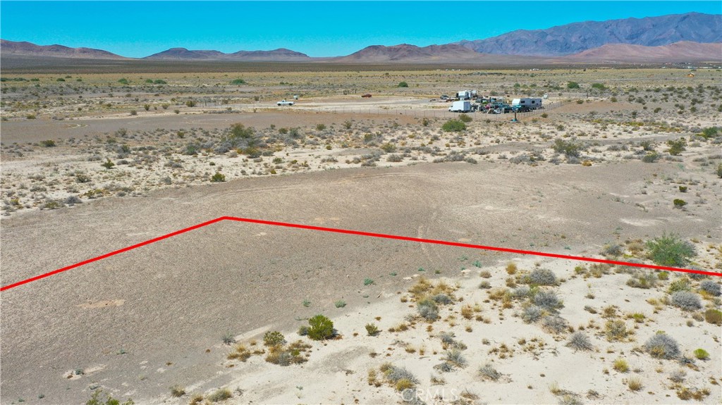 0 Carpenter Way Tecopa, CA 92389 - Photo 29 of 31 a view of an ocean beach and mountain