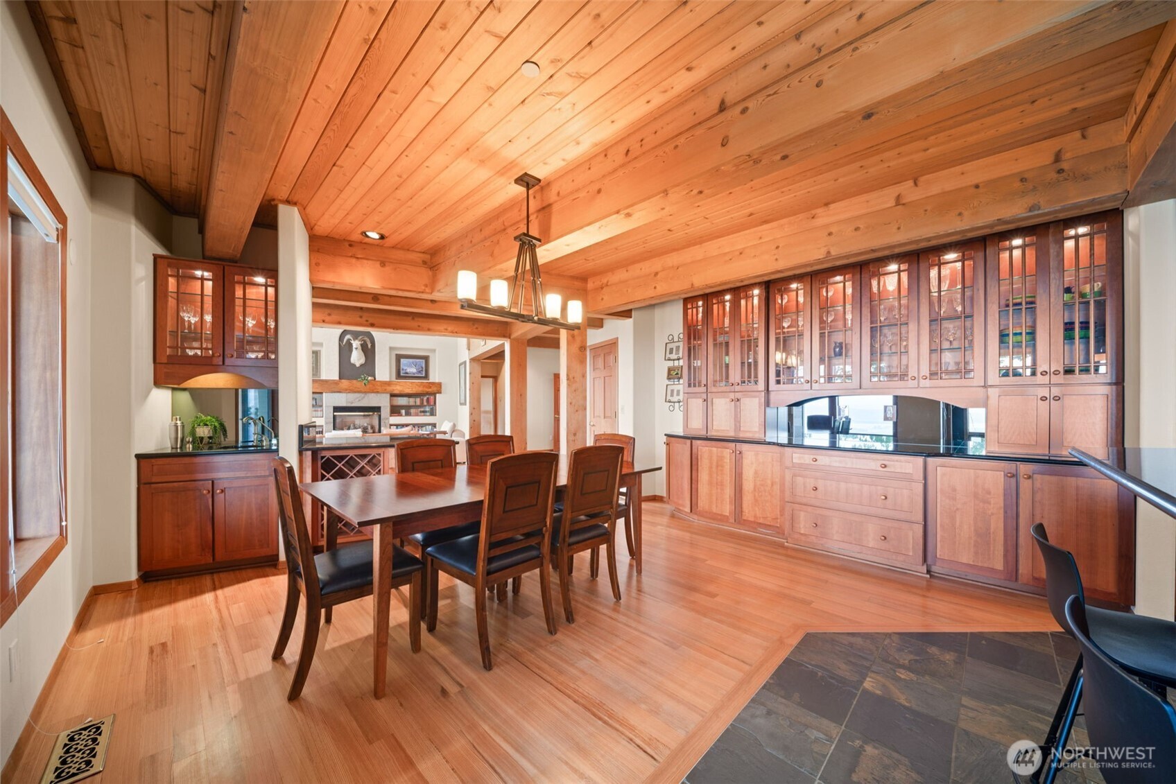 813 Varsity Road Kalama, WA 98625 - Photo 10 of 40 a dining room with furniture a chandelier and wooden floor