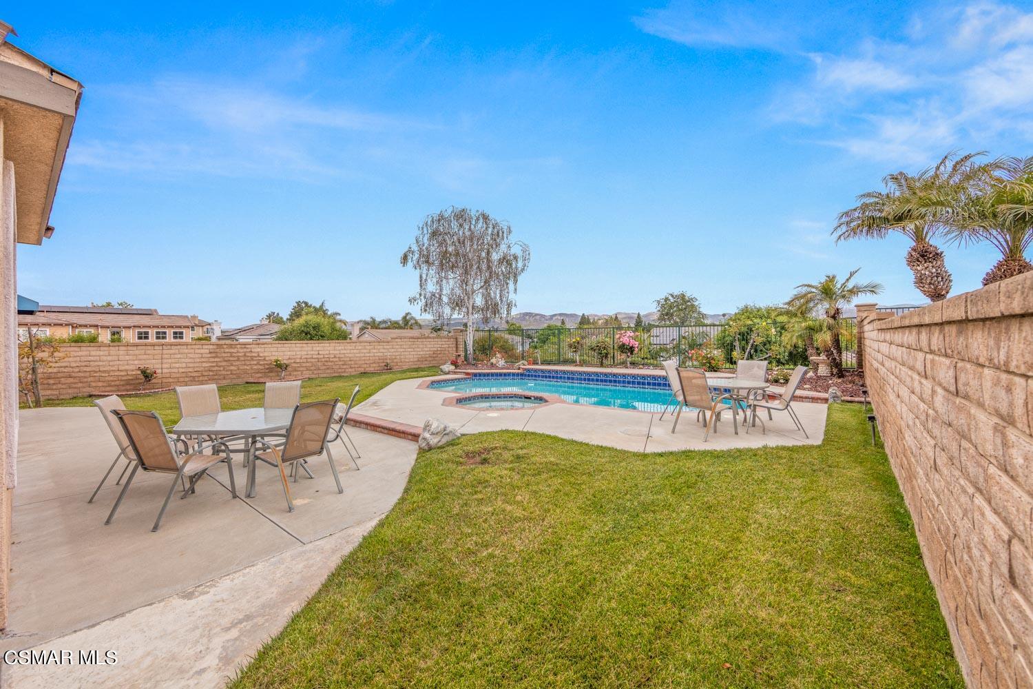 3453 Almond Tree Court Simi Valley, CA 93065 - Photo 18 of 20 a view of a swimming pool with outdoor seating space