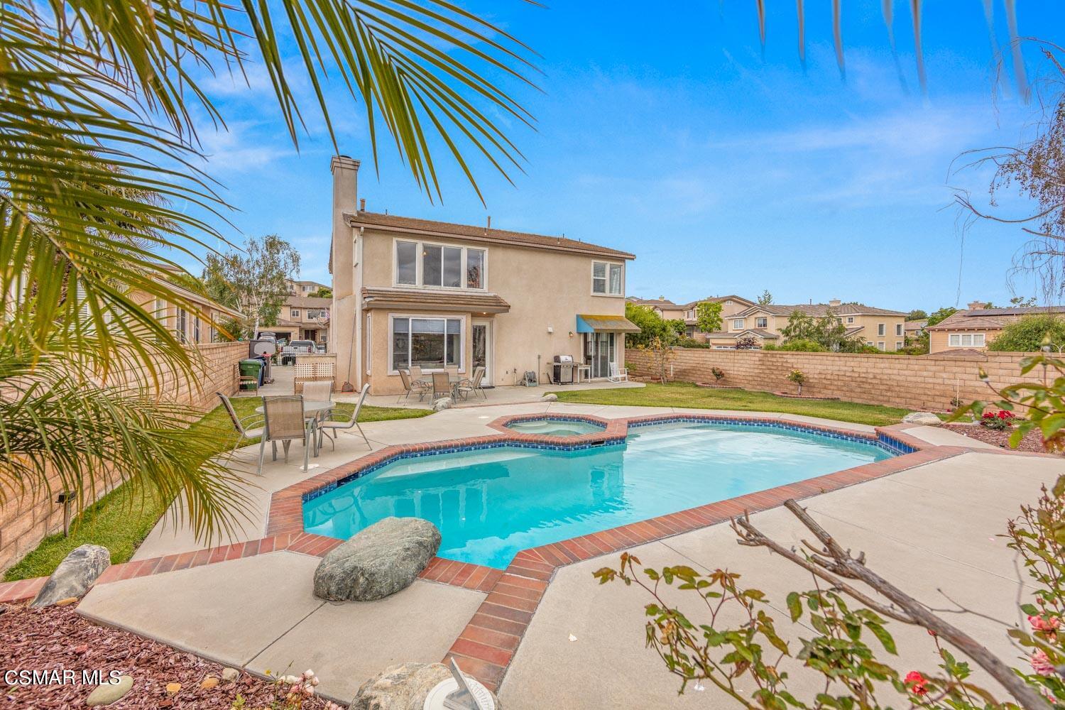 3453 Almond Tree Court Simi Valley, CA 93065 - Photo 20 of 20 a view of a house with swimming pool