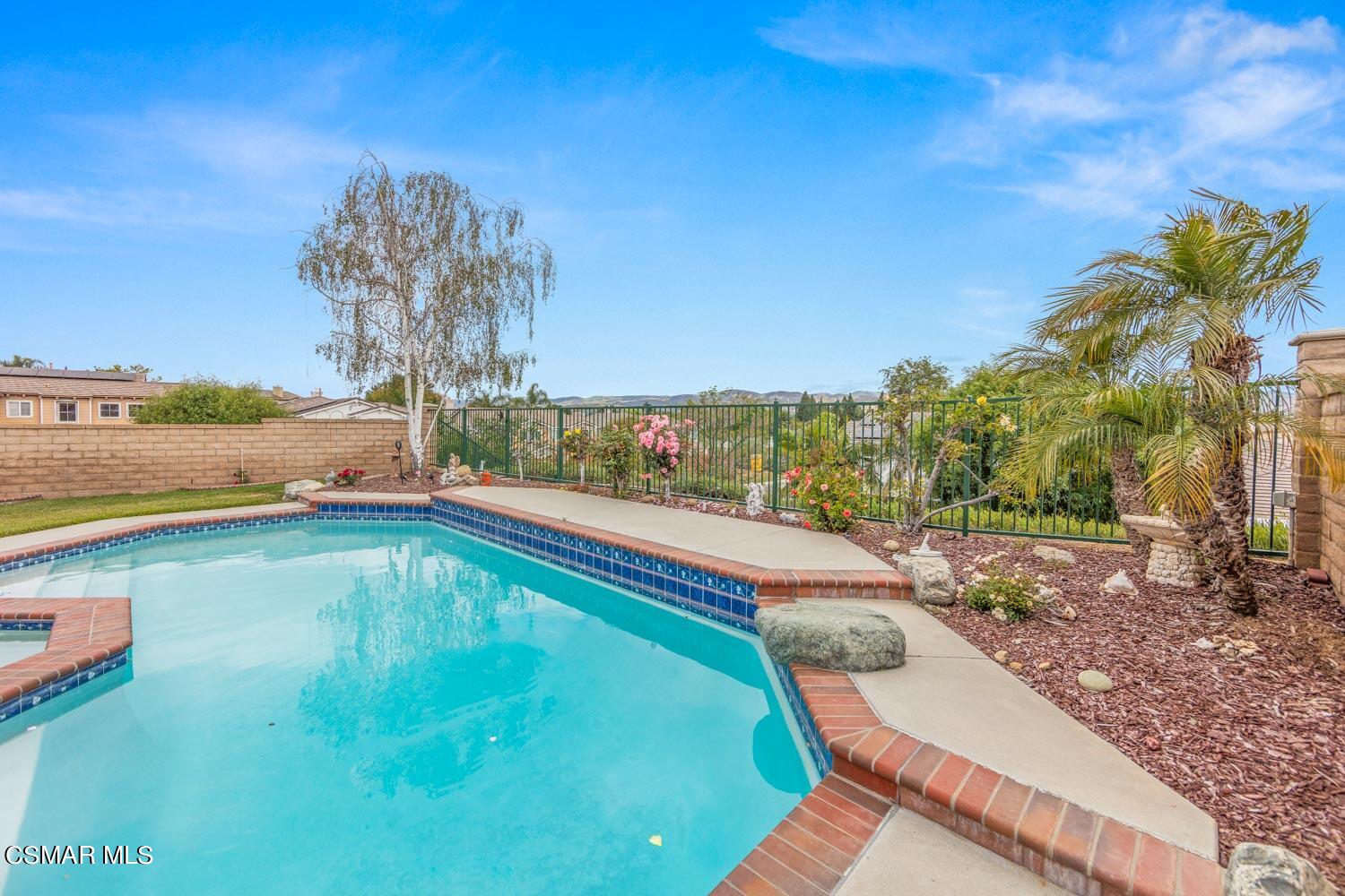3453 Almond Tree Court Simi Valley, CA 93065 - Photo 2 of 20 a view of a swimming pool and an outdoor space