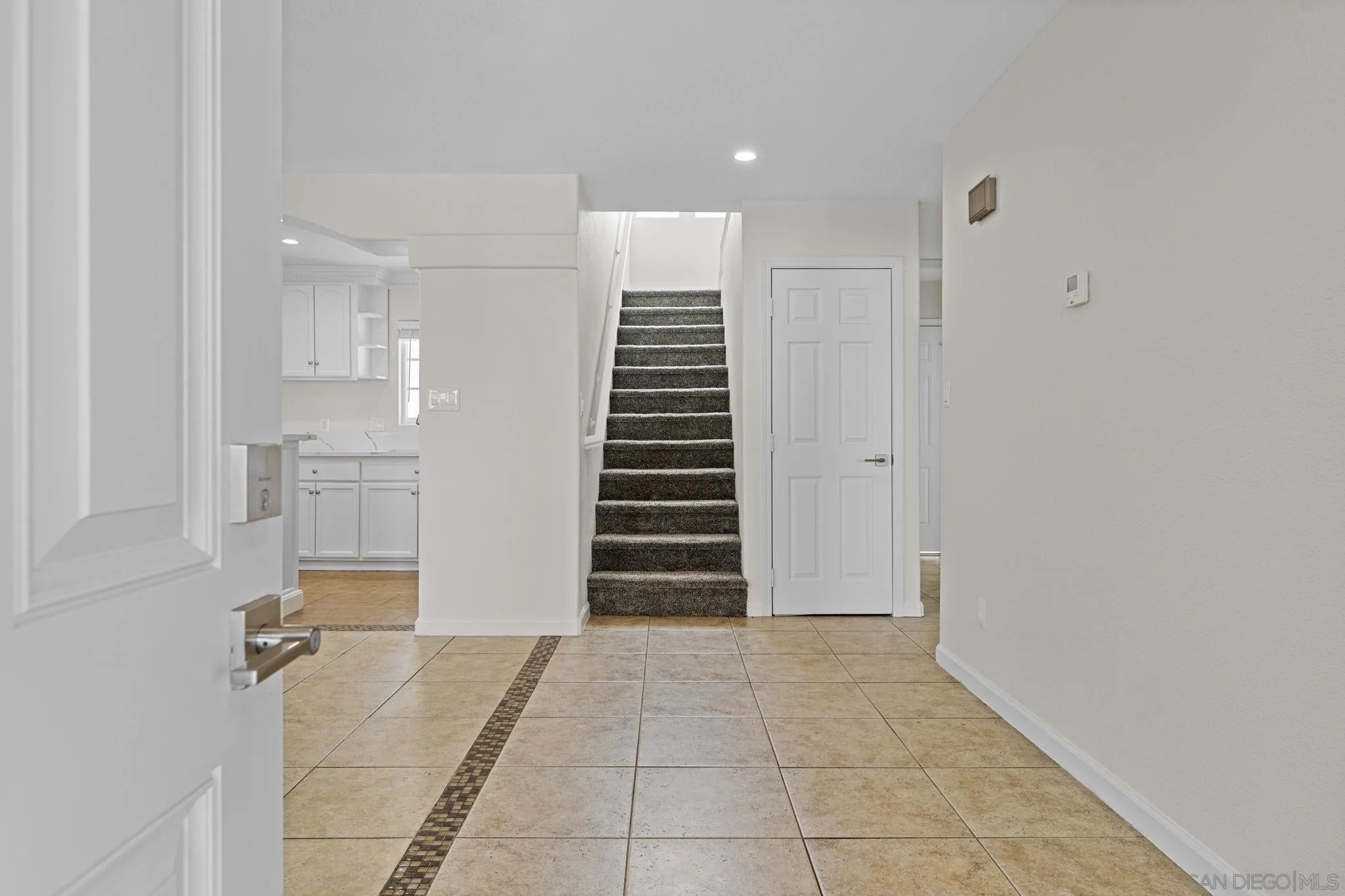 1749-51 Dahlia Avenue San Diego, CA 92154 - Photo 11 of 23 a view of room with stairs and ventilation