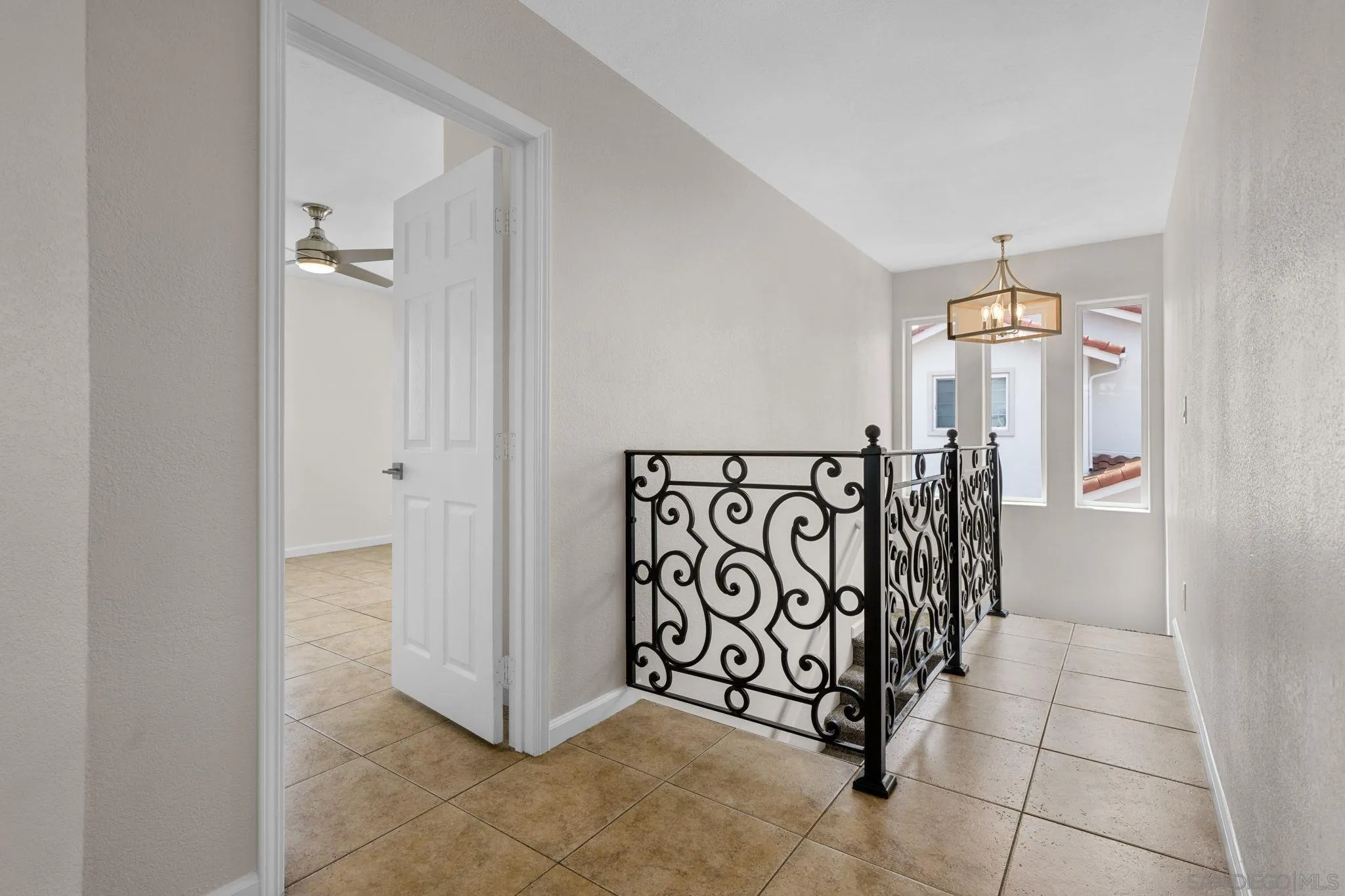 1749-51 Dahlia Avenue San Diego, CA 92154 - Photo 12 of 23 a view of a hallway with entryway