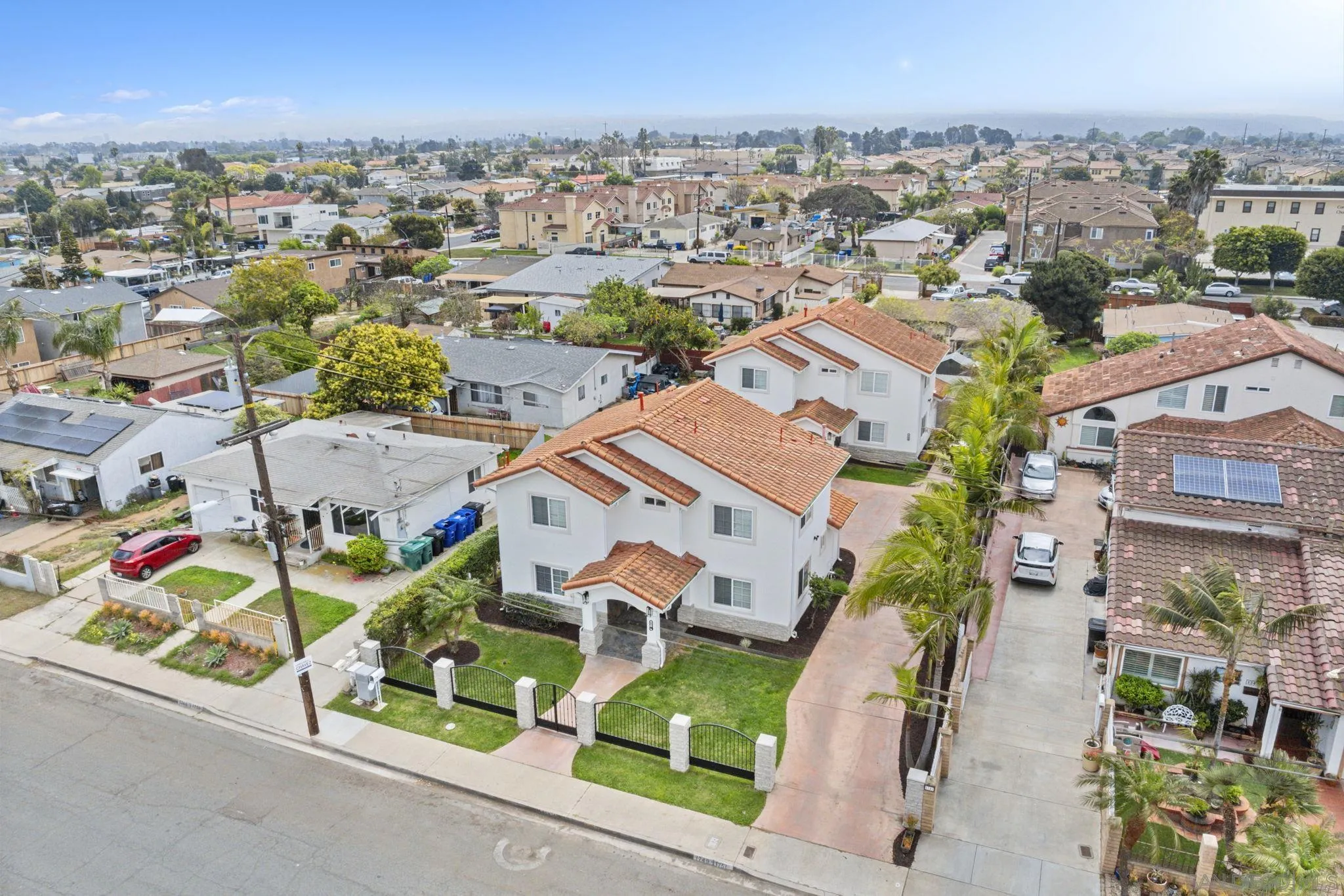 1749-51 Dahlia Avenue San Diego, CA 92154 - Photo 21 of 23 an aerial view of residential houses with outdoor space