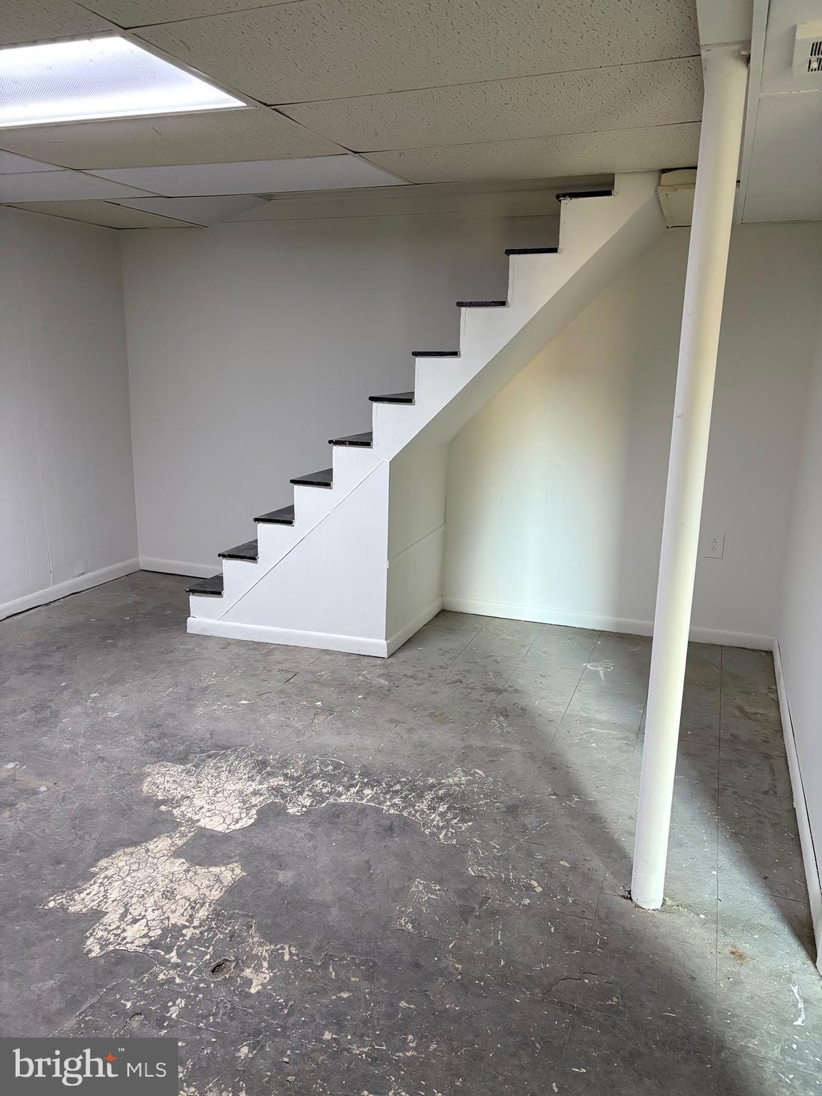 120 Overhill Avenue Philadelphia, PA 19116 - Photo 10 of 16 a view of an empty room with stairs