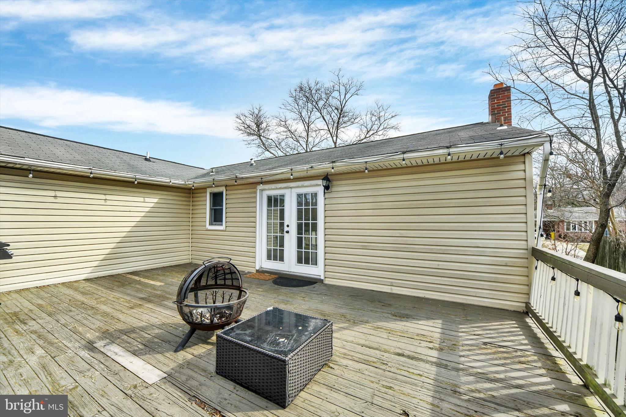 404 Homewood Road Linthicum Heights, MD 21090 - Photo 23 of 24 a view of a deck with wooden floor and fence
