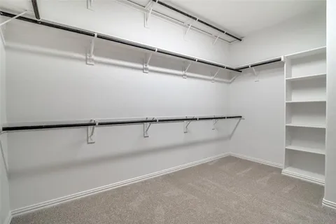 a view of a room with racks on the wall