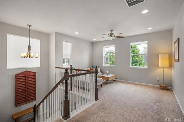 a view of room with furniture and windows