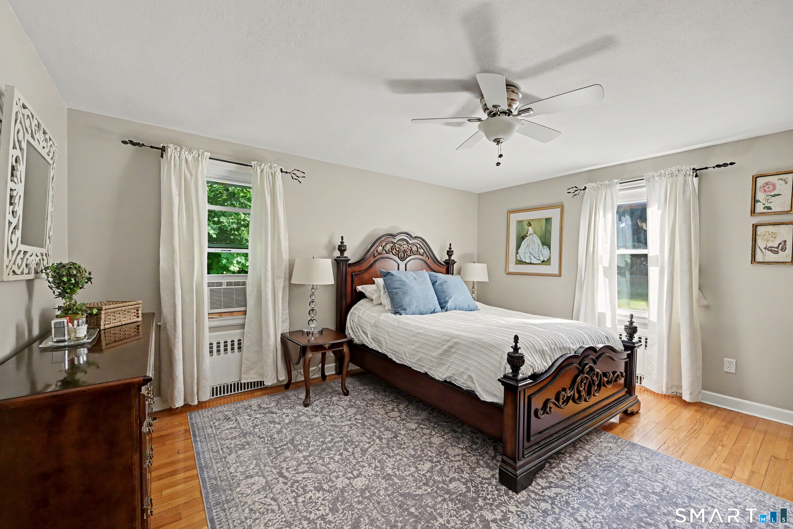 524 Ferry Road Orange, CT 06477 - Photo 23 of 40 a bedroom with a bed and a window