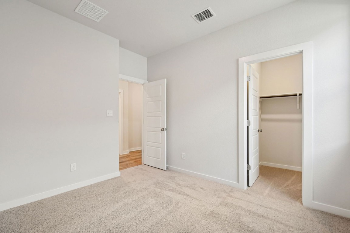 13413 Derby Ride Drive Buda, TX 78610 - Photo 12 of 36 a view of an empty room