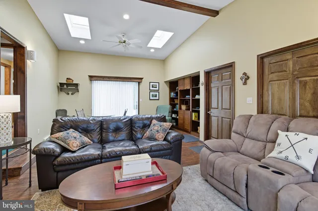 a living room with furniture and a couch